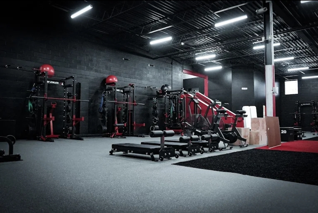 Mobtown Athletics training floor with squat racks and conditioning equipment